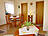 Ferienwohnung in Born a. Darß - Wohnzimmer mit Esstisch