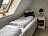 Schlafzimmer mit Einzelbetten